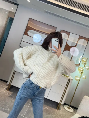 Soft waxy gentle wind turtleneck pullover sweater women's autumn and winter loose lazy tassel holes all-match warm knitted top