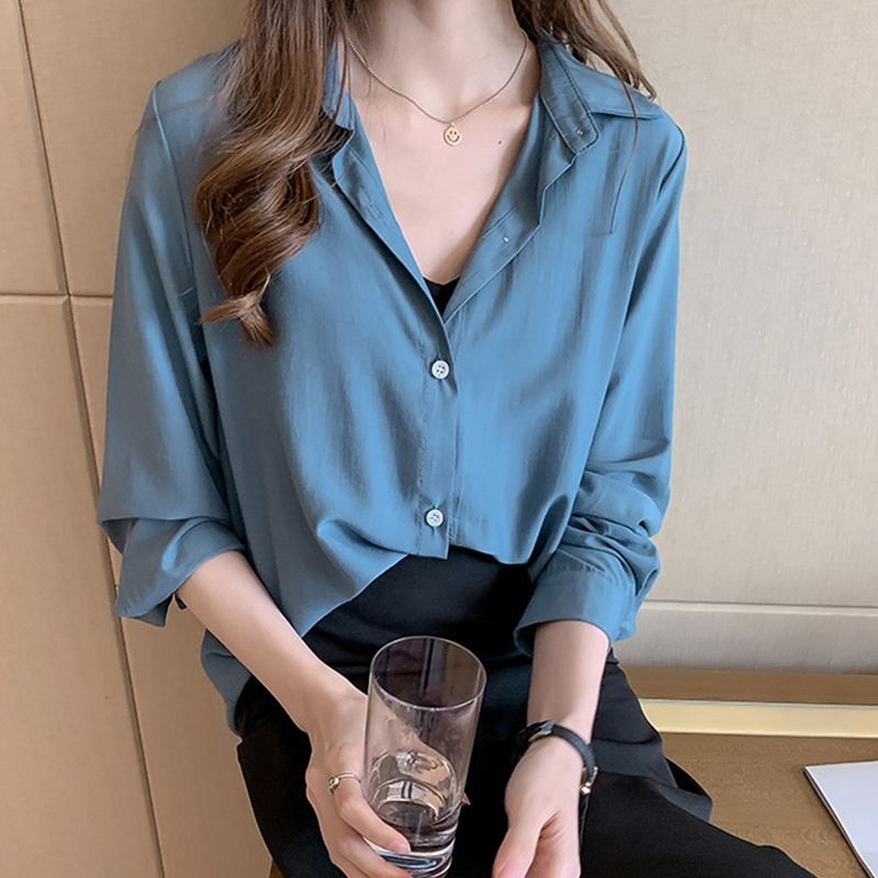Large size blouse 2023 spring new Korean version loose design sense niche top long-sleeved white bottoming shirt
