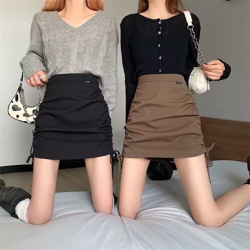 Spring and summer new high waist bag hip skirt solid color drawstring pleated A-line skirt women's sweet and spicy sexy skirt