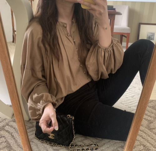 Korean chic French retro round neck single-breasted lantern sleeve design loose and versatile solid color shirt top women