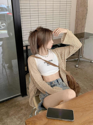 Khaki holiday style hollow out sunscreen knitted cardigan women's design sense suspender skirt with thin blouse jacket summer