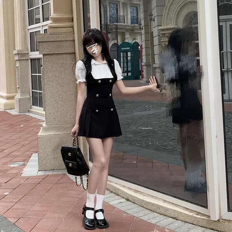 Sweet and pure rich girl puff sleeve dress female summer Korean version slim short-sleeved doll collar fake two-piece skirt