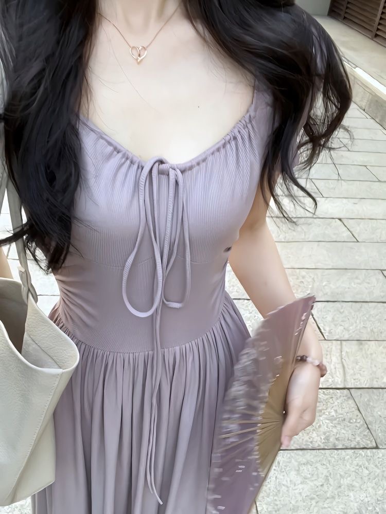 2023 early spring Huanxin hand-designed commuting travel simple and versatile sunny temperament ballet waist dress
