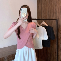 Real shot high-end cross irregular shirt female design sense niche 2023 summer new thin short-sleeved top