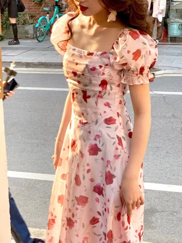 Summer 2023 new texture high-quality seaside vacation long skirt temperament slim floral hanging neck dress women