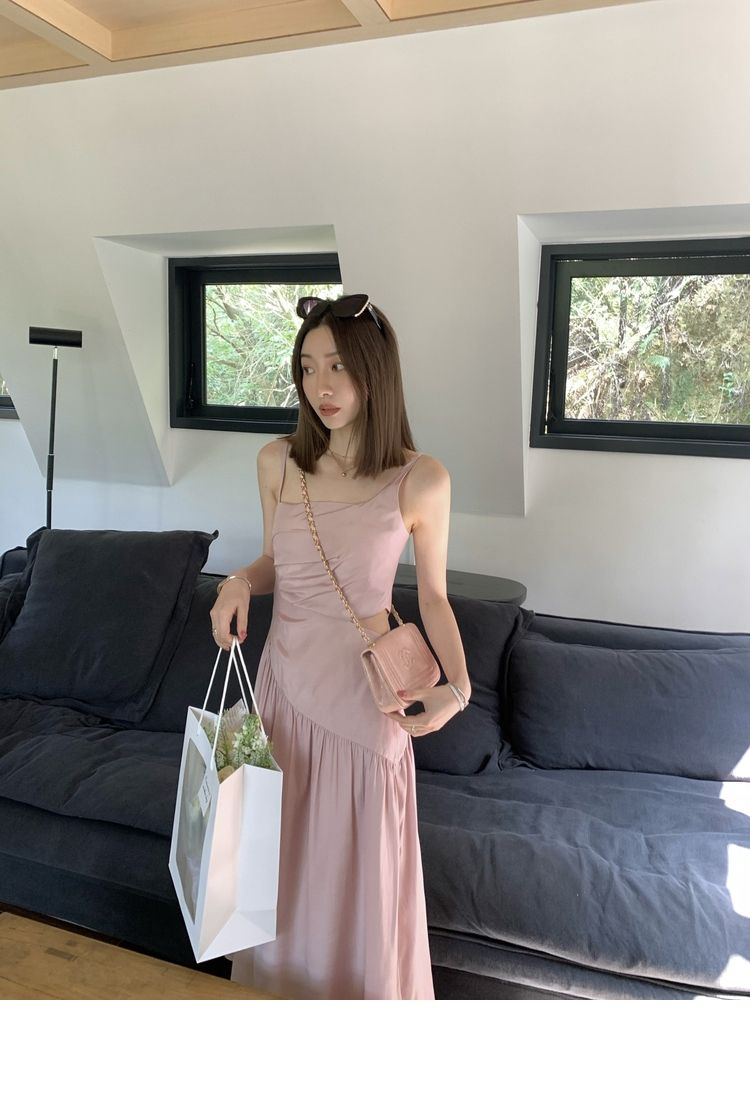 Irregular pleated suspender dress women 2023 spring and summer new high-end light luxury waist slimming long skirt