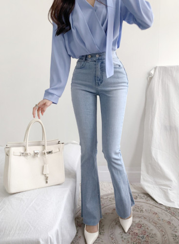 #High-waisted washed two-button slightly spicy raw-edged denim trousers