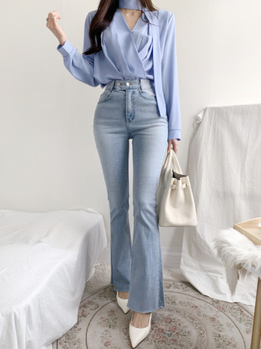 #High-waisted washed two-button slightly spicy raw-edged denim trousers
