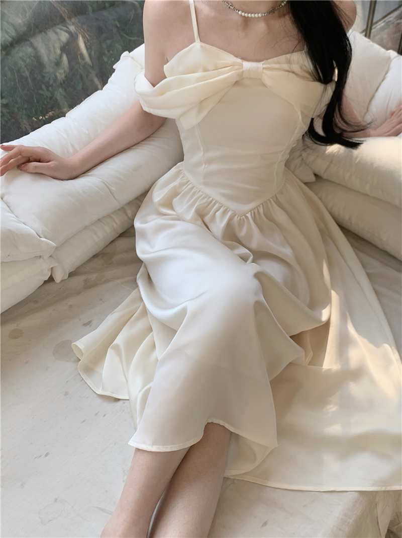 Fairy skirt 2023 summer new temperament fashion solid color gentle waist slimming bow strap dress