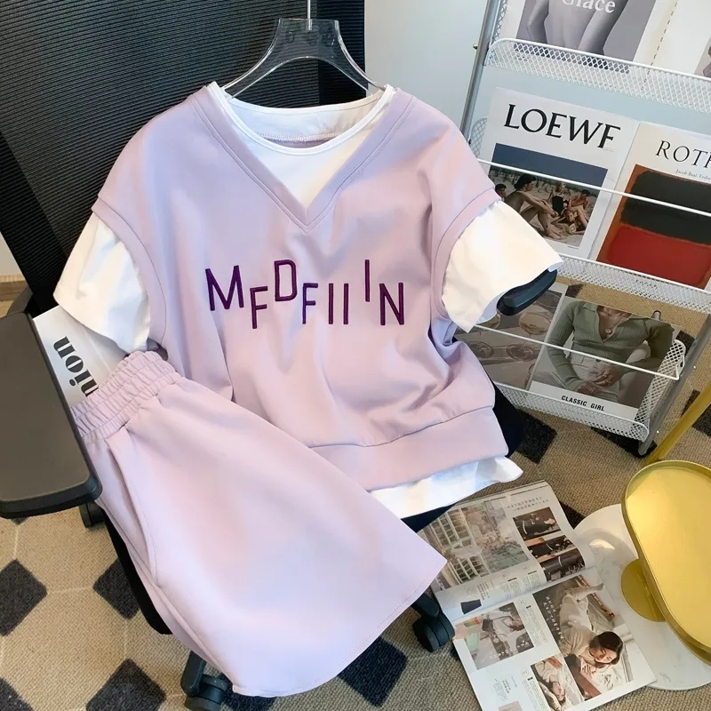 2023 spring and summer new suit female student Korean version loose fake two-piece short-sleeved T-shirt + casual shorts two-piece set tide