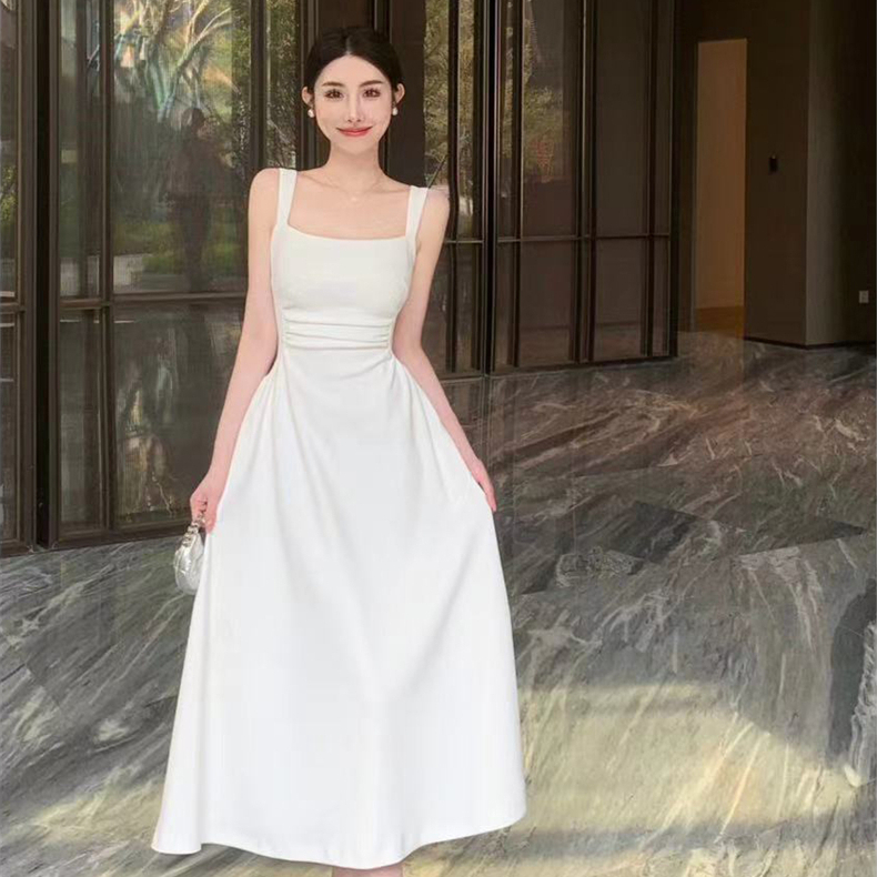 French temperament Hepburn style black and white sling dress women's summer 2023 new solid color dress