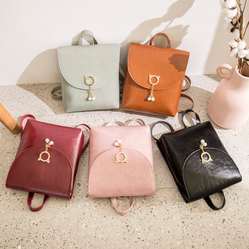 Real shots of foreign trade bags new Korean version of oil wax leather charm small backpack simple ladies backpack women's bag