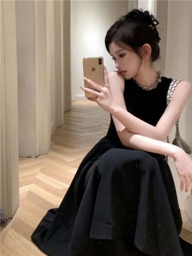 Black round neck sleeveless French retro super fairy over-the-knee dress women's summer design sense hollow backless long skirt