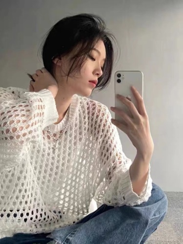 Knitted hollow sunscreen women's summer thin section loose design sense niche chic unique drape long-sleeved blouse top