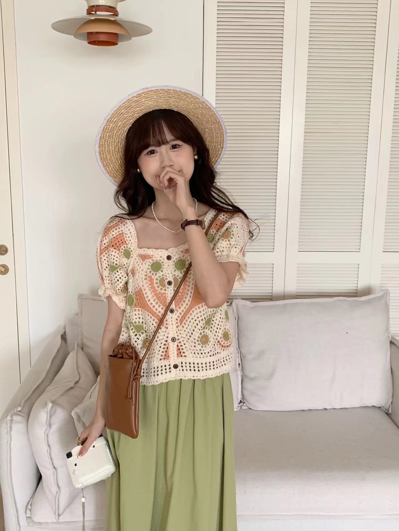 Crochet hollow knitted sweater women's short-sleeved summer 2023 new fashion age-reducing sweet chic short top