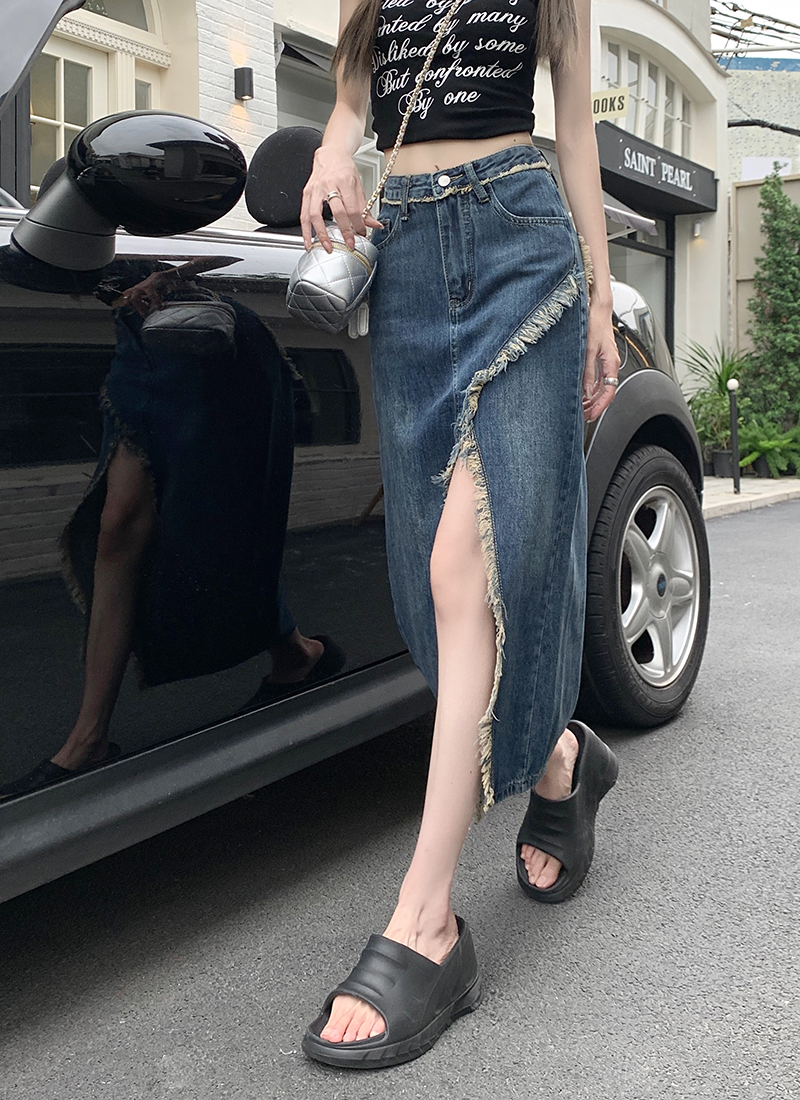 Real price 2023 summer new high-waist denim skirt women's design sense A-line hot girl bag hip raw edge long skirt