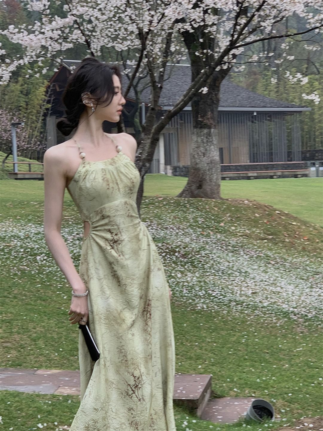From a moment printing hanging neck suspender dress female 2023 summer new temperament gentle waist long skirt