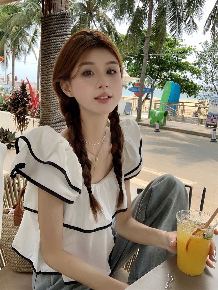 Sweet lotus leaf collar shirt women's summer 2023 new holiday style design sense of slimming and age reduction chic tops