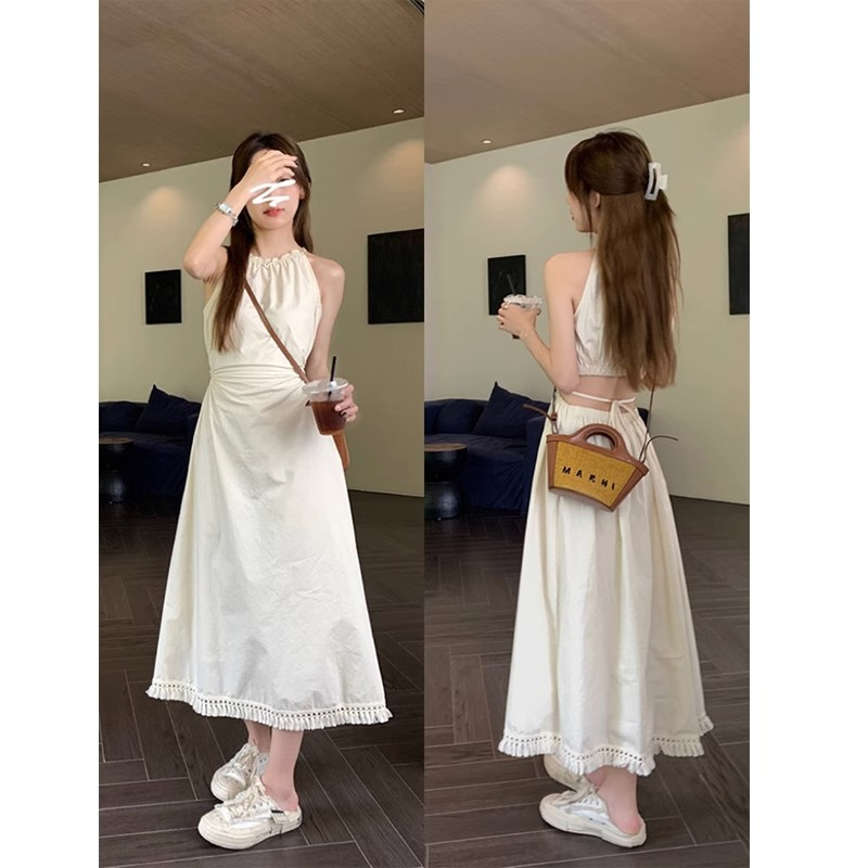 Wu 77 design sense hollow out waist hanging neck suspender dress women's tie waist slim holiday wind tassel dress