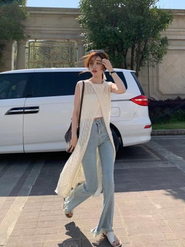 Wearing a white vest cool feeling ins style knitted blouse 2023 new Korean style loose hook flower all-match top women