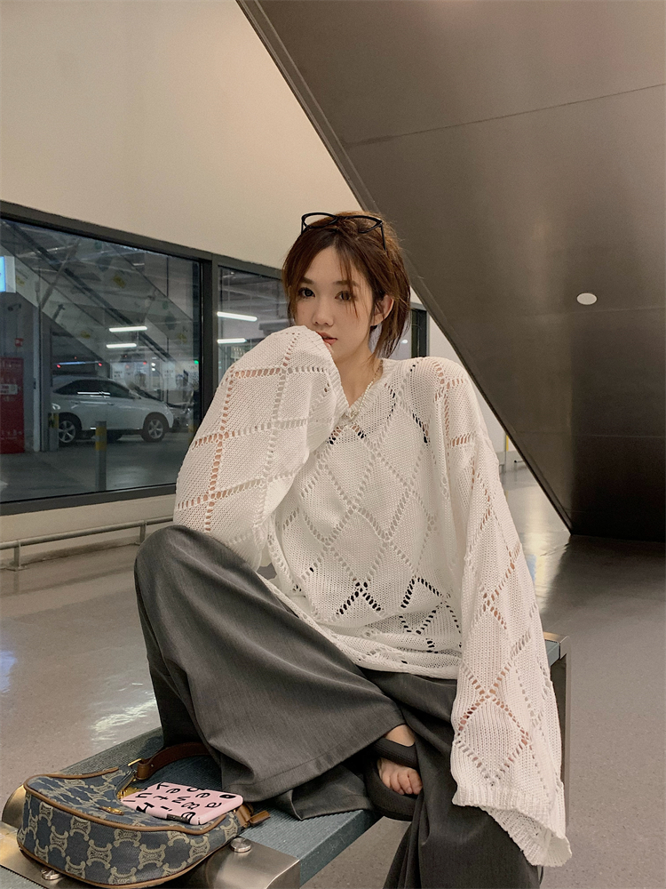 Round neck loose hollow large version long-sleeved slit sweater women's lazy wind mid-length large size early autumn knitted sweater top