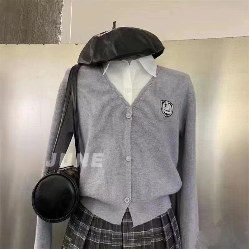 2023 autumn new Korean style design college style shirt collar splicing fake two-piece long-sleeved cardigan top women
