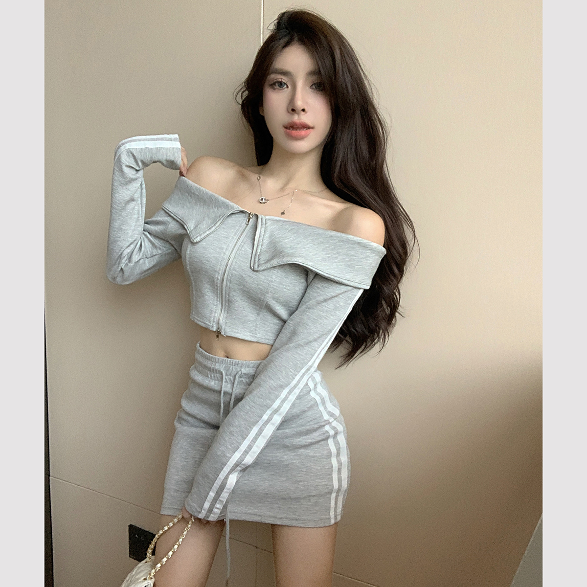 One-shoulder sports and leisure college suit all-match American style bag hip hot girl skirt drawstring two-piece set