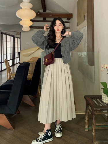 Ren Xiaoyi knitted sweater cardigan jacket female 2023 new Korean version loose v-neck niche hollow chic top autumn
