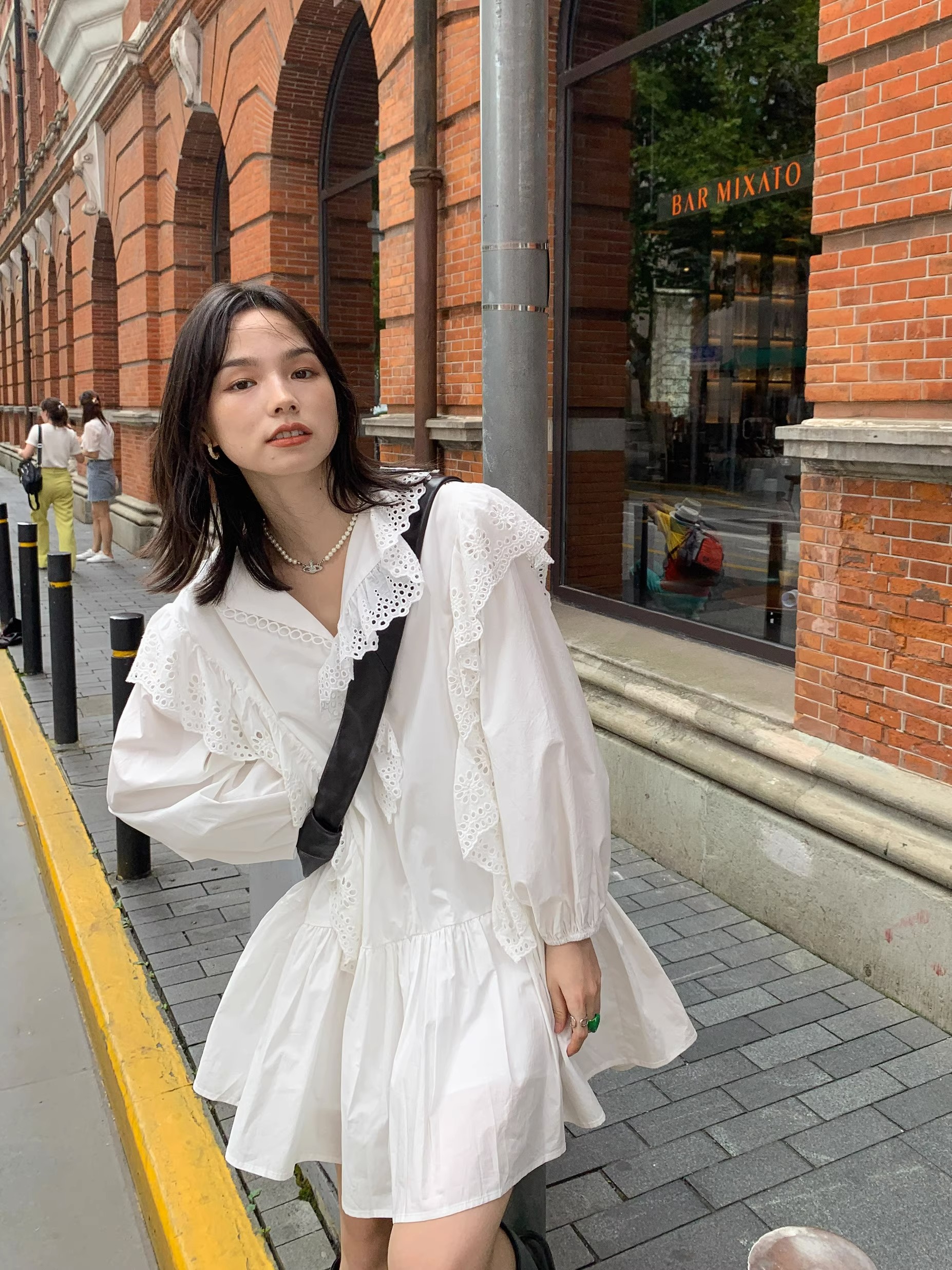 White ruffled dress female niche design sense 2023 spring and autumn new sweet and gentle wind small skirt
