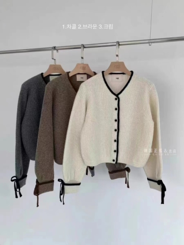 New hot product Korea Dongdaemun purchasing agent sweet age-reducing bow-knot patchwork sweater jacket