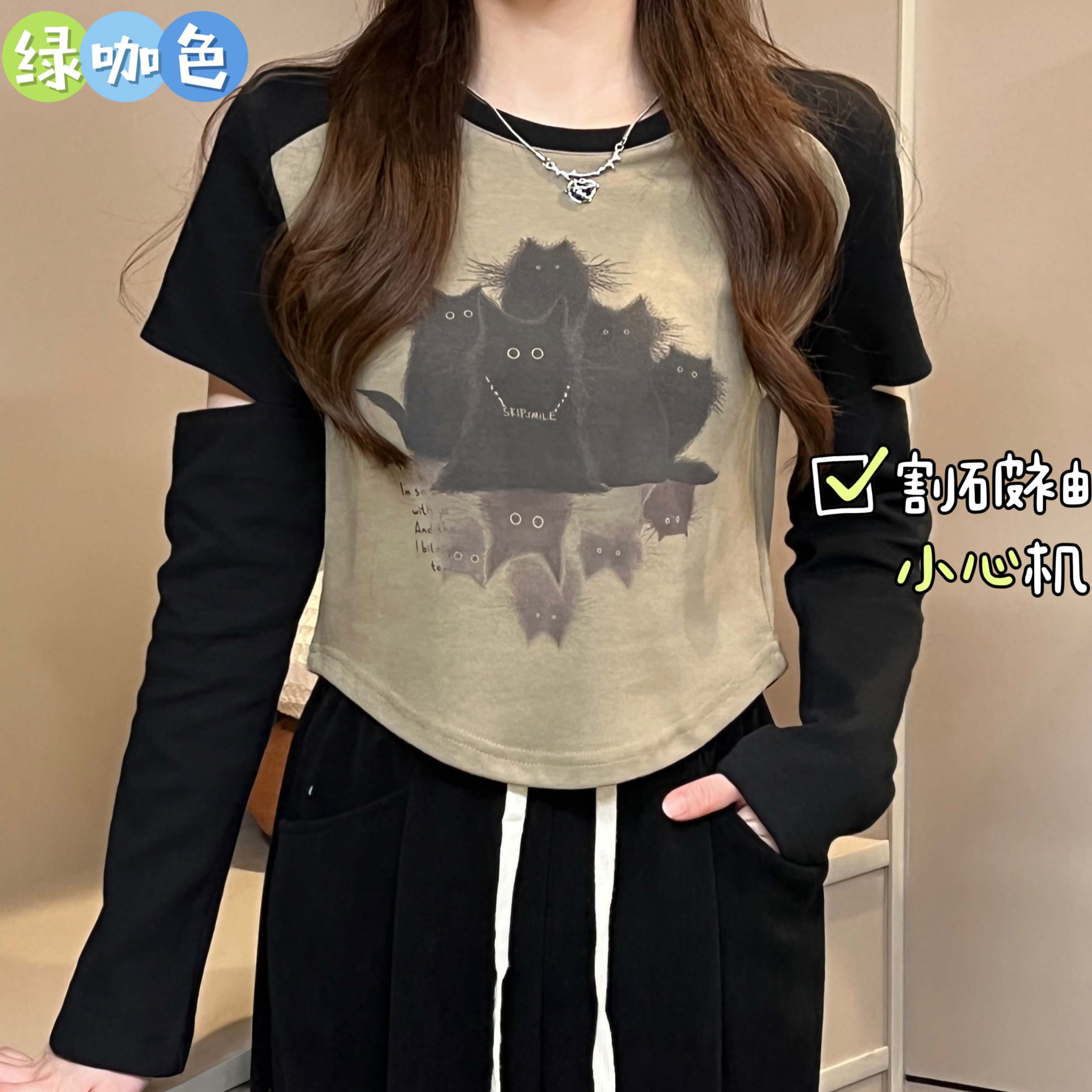 大碼女裝今年流行漂亮小衫割破長袖t恤秋季顯瘦遮肉獨特别致上衣