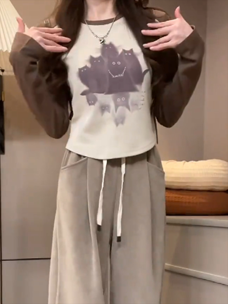 大碼女裝今年流行漂亮小衫割破長袖t恤秋季顯瘦遮肉獨特别致上衣