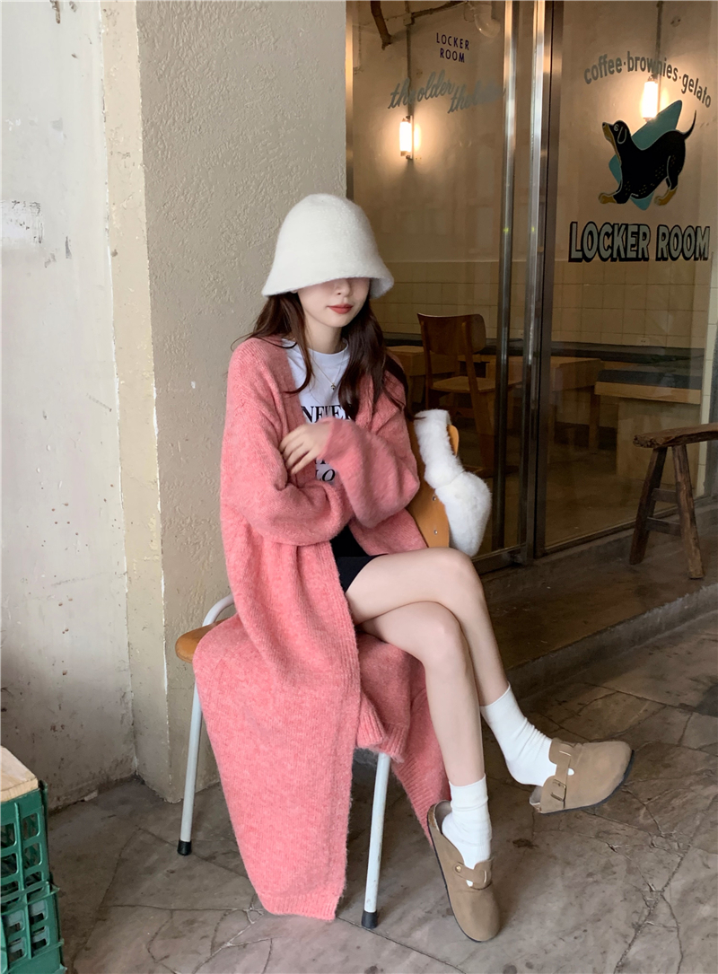Actual shot of a lazy, casual and versatile long pink sweater and cardigan jacket