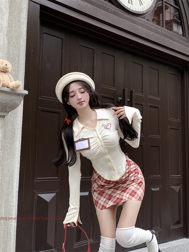 Actual shot of girls' restricted area, autumn outfit with a complete set of fashionable apricot tops, plaid skirt suit