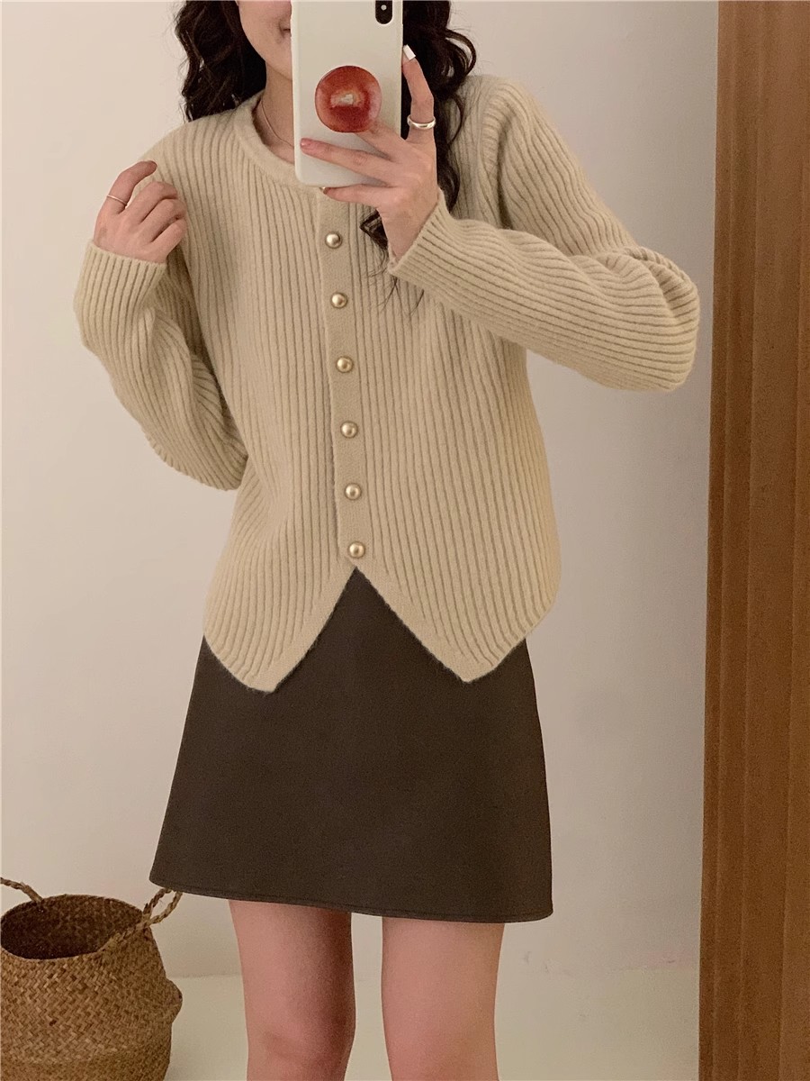 設計感下擺不規則圓領單排扣針織開衫女秋季新款純色長袖毛衣外套