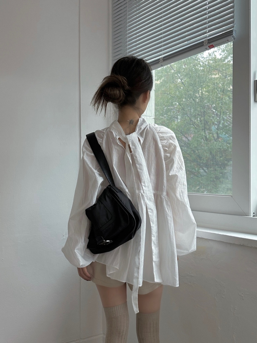 Korean chic autumn new French design lace-up long-sleeved shirt women's loose age-reducing doll shirt
