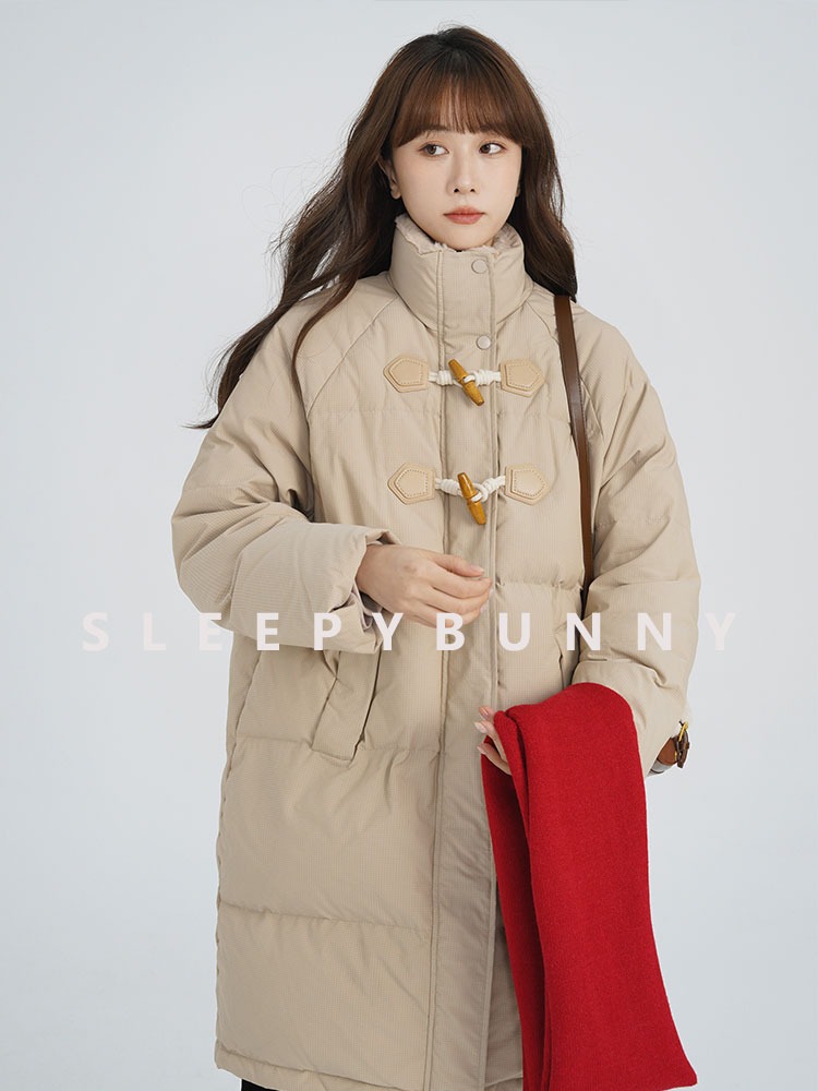 Official photo of Miss Chipmunk, milky croissant long croissant button down puffer jacket for women petite