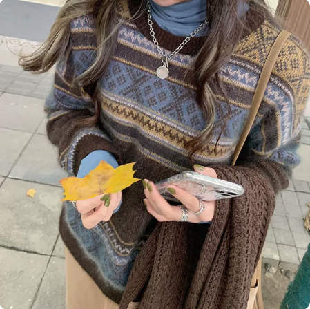 秋冬年新款加厚炸街復古高級感歐貨浣熊絨氣質毛衣女寬鬆