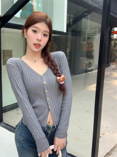 Actual shot of new autumn and winter temperament pitted knitted cardigan solid color V-neck sweater slimming and versatile top