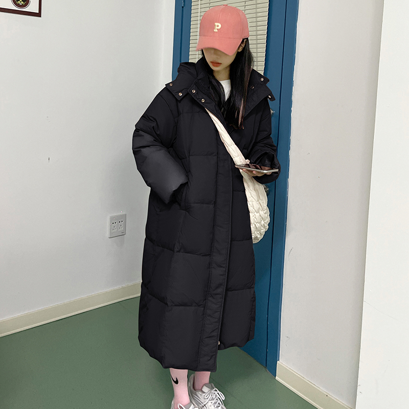 Actual shot of Korean winter Korean version loose and versatile hooded down jacket for women, long over-the-knee thickened warm solid color jacket