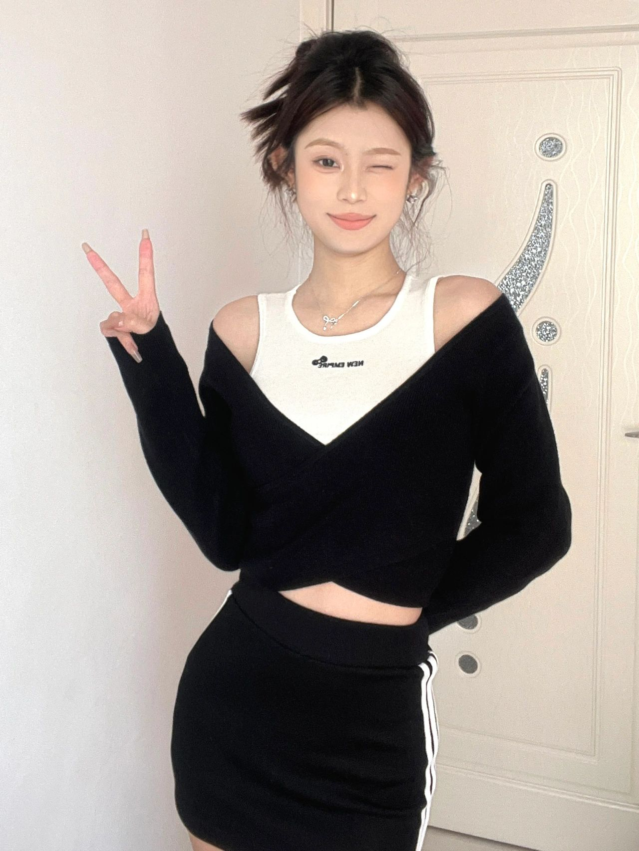 人棉隨心裁 黑色假兩件小眾設計感長袖t恤女露肩內搭純欲辣妹ins