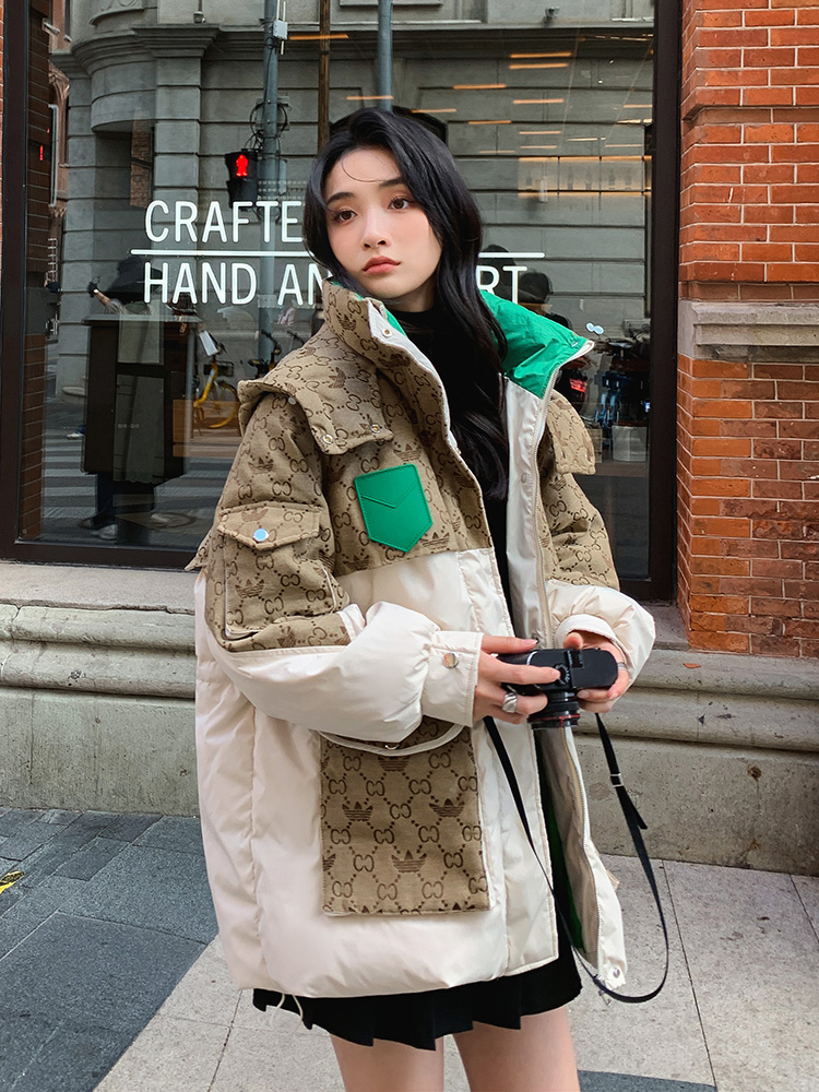 Hong Kong style retro down jacket for women winter 2023 new design stitching waist drawstring slimming white duck down jacket