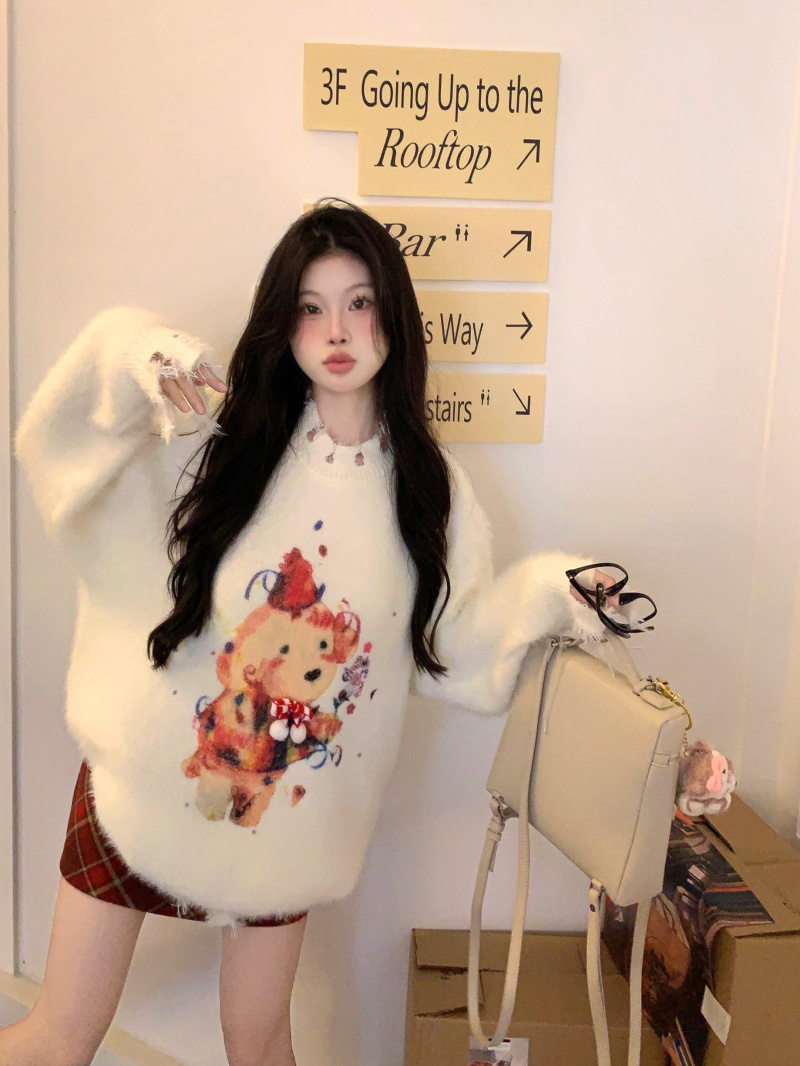 The letters have been changed. Actual autumn and winter irregular hem loose and slimming long-sleeved knitted sweater plaid skirt