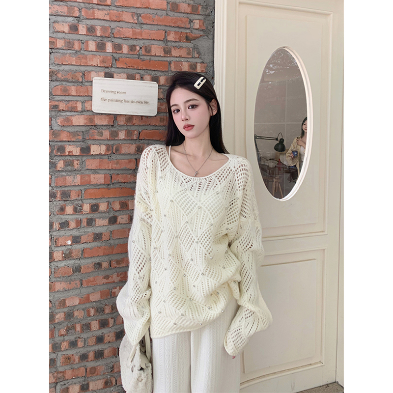 Gentle wind hollow long-sleeved sweater women's autumn 2023 new heavy industry design loose outer knitted top