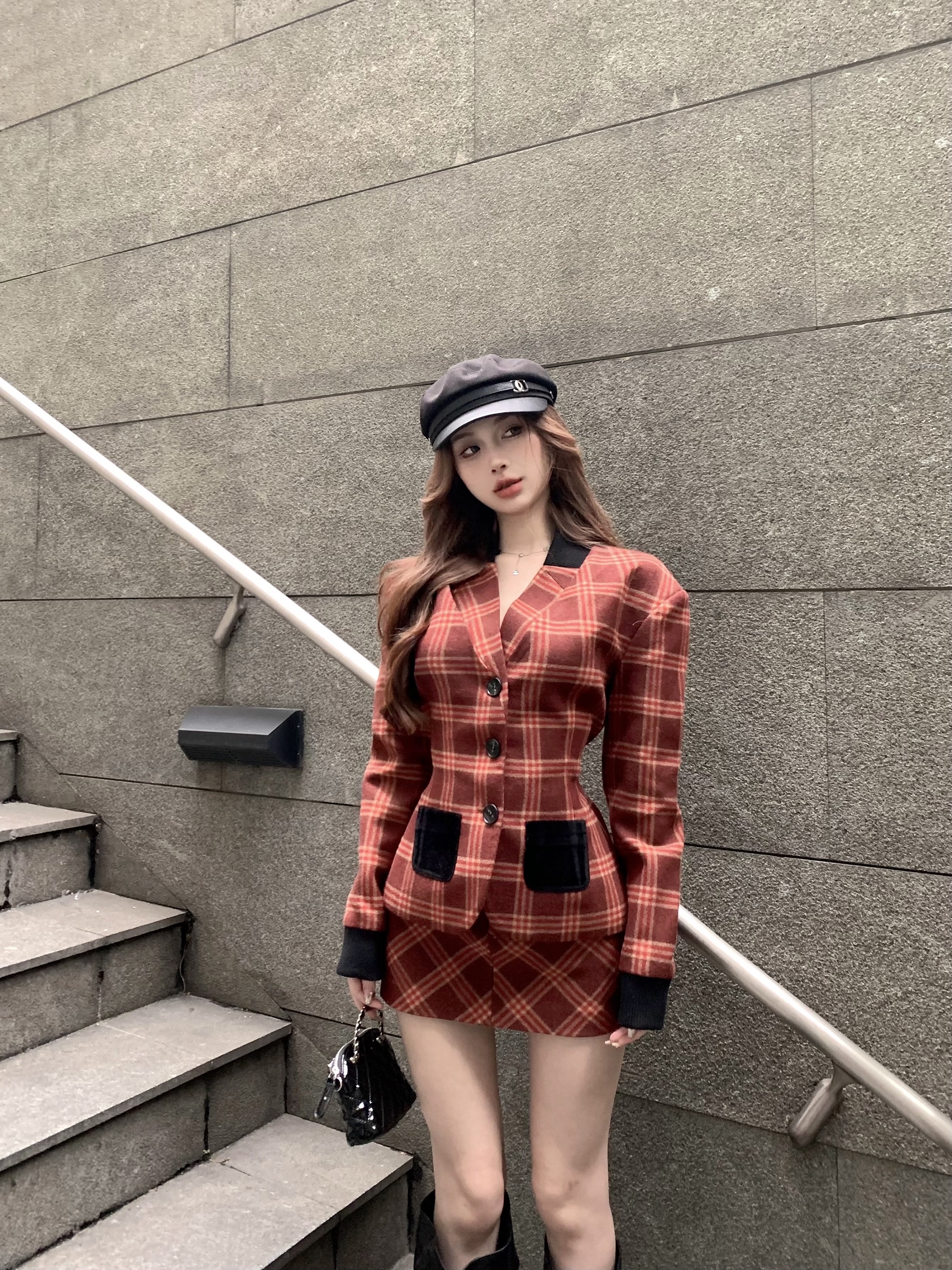 Real shot of cool senior American retro red plaid broad shoulder waisted woolen suit jacket + hip-covering skirt for women
