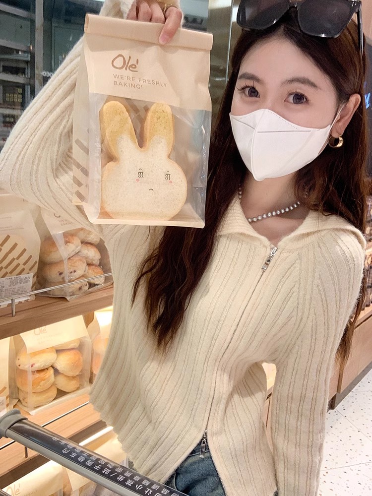 曾小咸 不規則套頭毛衣女秋冬修身粉色翻領針織衫長袖打底上衣