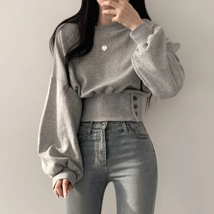 Korean chic autumn niche design round neck buttoned waist slimming long sleeve short pullover sweatshirt for women