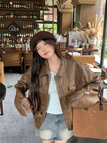 Real shot of American retro coffee-colored loose and slim leather jacket