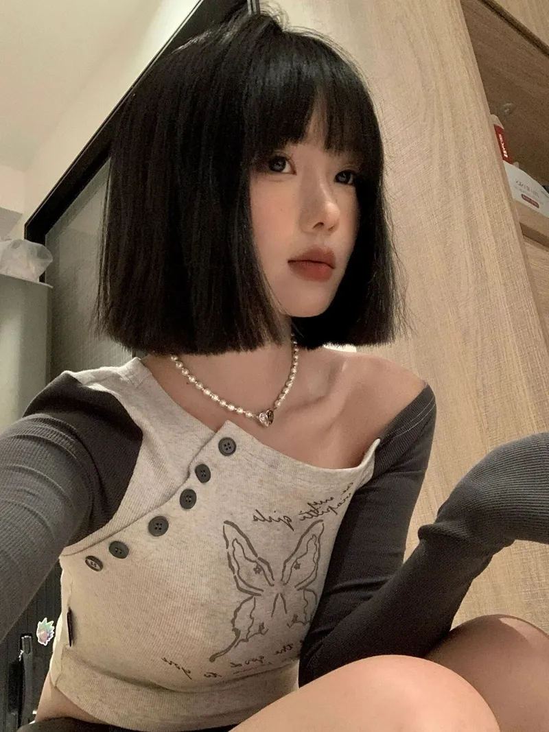 港味辣妹斜領排扣薄款長袖T恤女純欲風收腰修身短款上衣