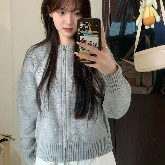 Autumn hollow round neck zipper knitted cardigan top casual women's design versatile short sweater jacket ins
